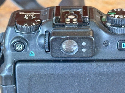 Canon PowerShot G12 10.0MP Digital Camera 5X Zoom Lens 6.1-30.5mm w/2 batteries